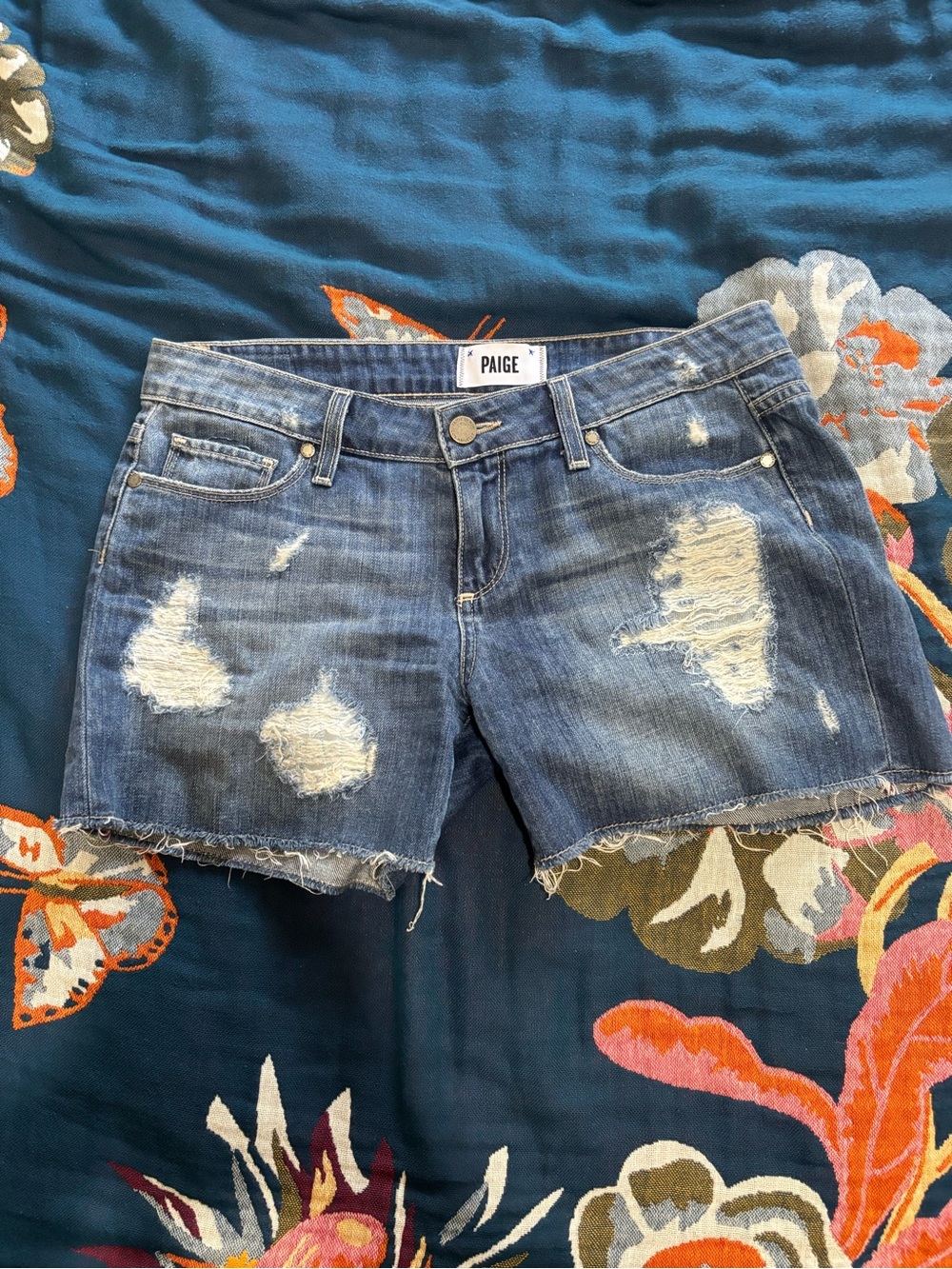 PAIGE Blue Distressed Cutoff Denim Shorts